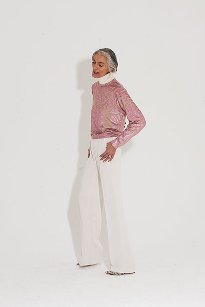 All Ages metal: pink white polo shirt white wide legged trousers