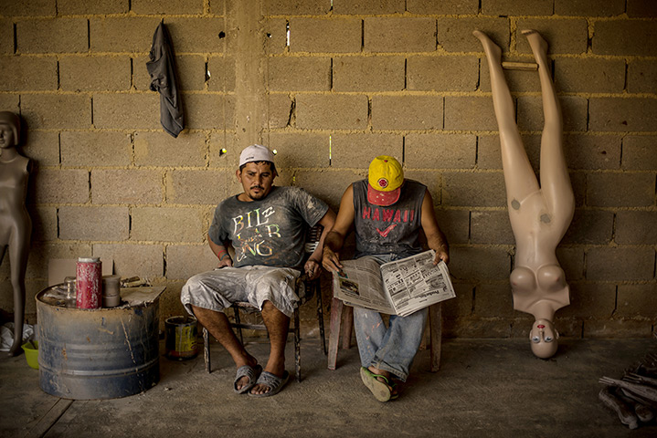 Well endowed mannequins: Workers construct mannequins at Eliezer Alvarez's workshop in Valencia