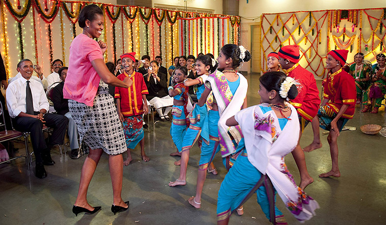 Michelle Obama at 50: November 7, 2010: First Lady Michelle Obama dances at a cultural event at a
