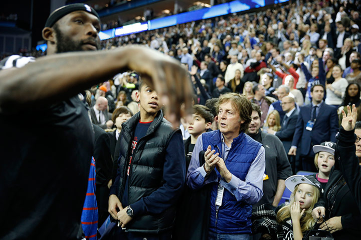 nba at the o2: Sir Paul McCartney applauds the Brooklyn players off