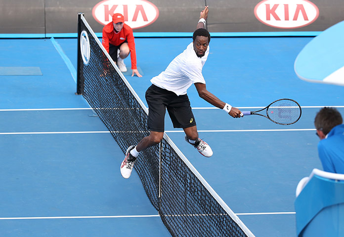 aussie open day 5: Gael Monfils jumps the net 
