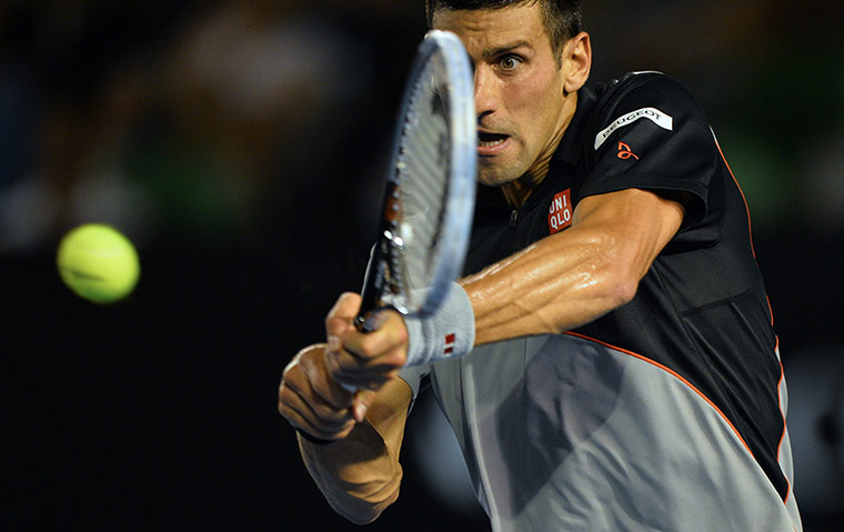 Aussie Open day five: Serbia's Novak Djokovic plays a shot 