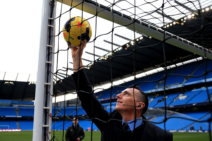 Saturday Round up: Referee Neil Swarbrick tests the goal line technology prior to kickoff