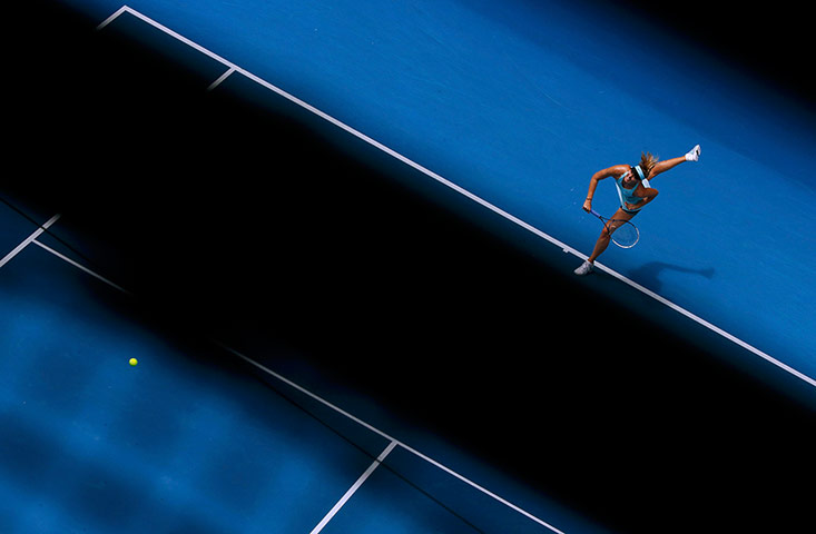 aussie open day 6: Maria Sharapova serves to Alize Cornet