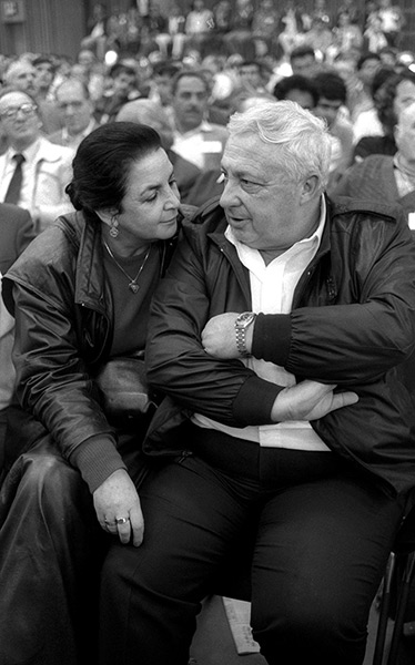 Ariel Sharon in pictures: 1986: Industry and Trade Minister Sharon sits with his wife Lily during a H