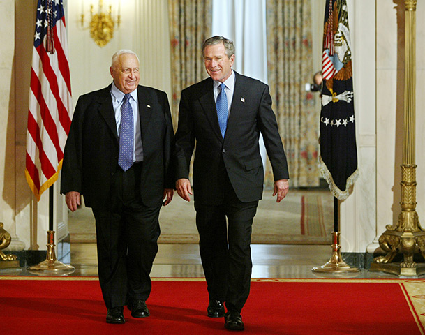 Ariel Sharon in pictures: 2004: President George W Bush walks with Israel's Prime Minister Ariel Shar