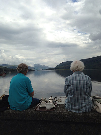 Your Pics - friendship: two elderly women sitting by lake