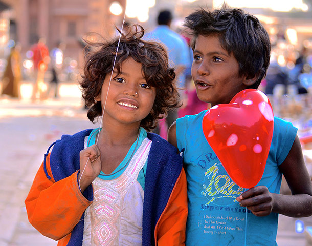 Your Pics - friendship: two asian boys in street smiling