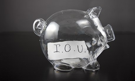 Piggy bank with IOU in it