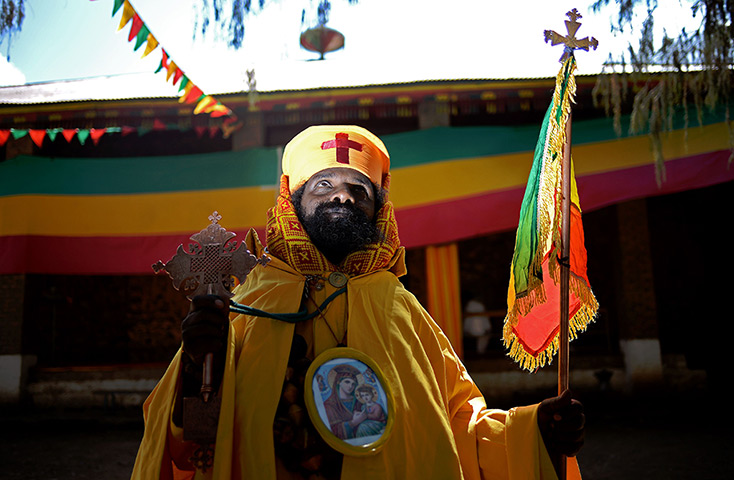 FTA: Carl de Souza: A priest poses for a photograph