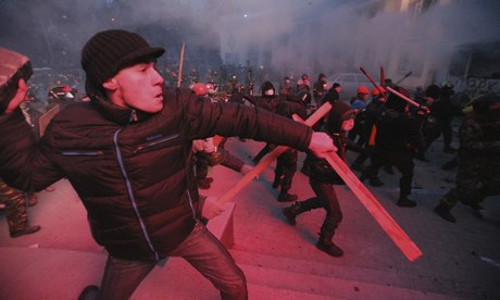 Protesters clash with police in Kiev, Ukraine, on Sunday. Photograph: Kommersant via Getty Images