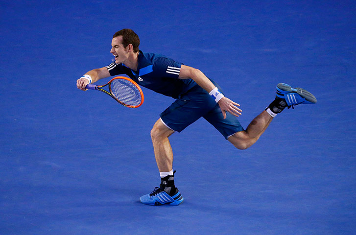 Murray v Federer: Andy Murray of Britain hits a return to Roger Federer 
