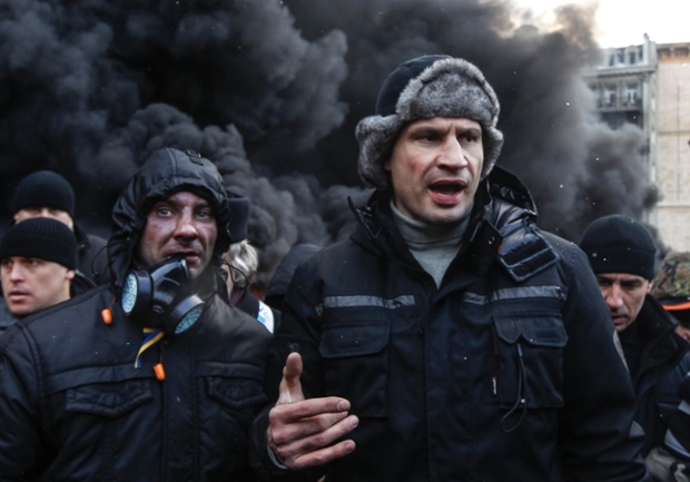 Opposition leader Vitaly Klitschko, right, talks with pro-European integration protesters.