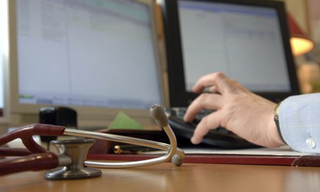 A GP updates medical records