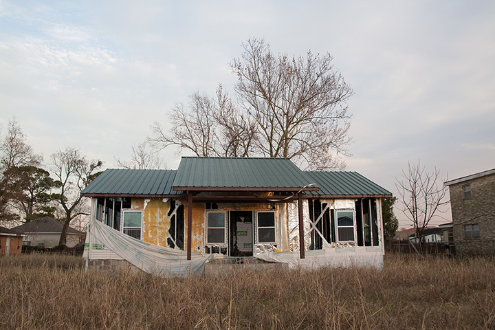 Rebuilding New Orleans: A house  where re-construction started and then stopped