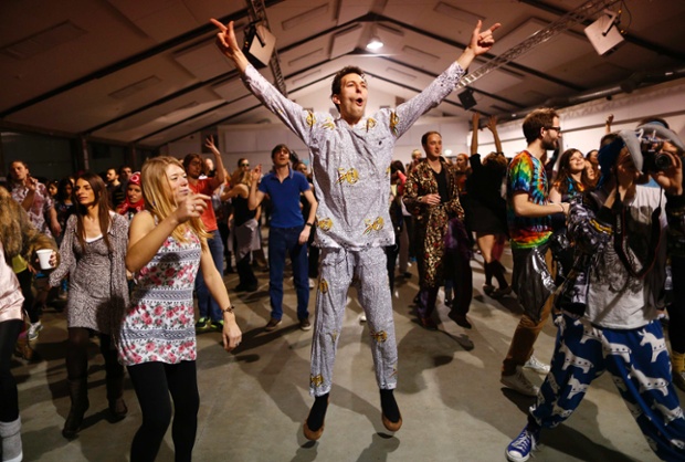 Revellers dance in their sleepwear at Morning Glory, in a venue in Hackney, London. 