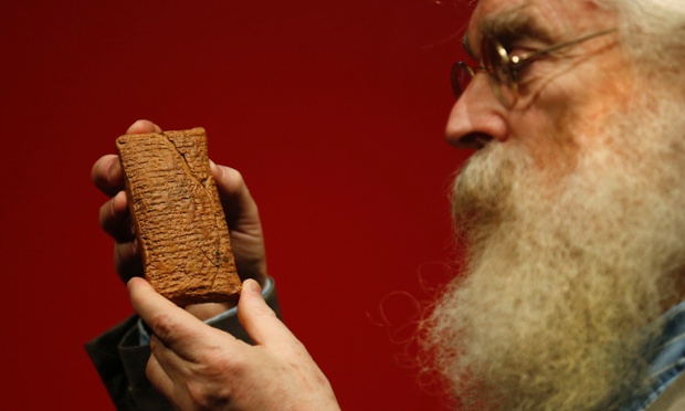 Irving Finkel with the 4000 year old clay tablet containing the story of the Ark and the flood during the launch of his book 'The Ark Before Noah' at the British Museum in London.