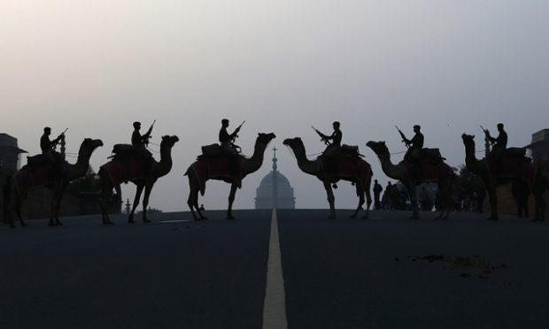 India's Border Security Force (BSF) soldiers ride their camels in front of India's presidential palace