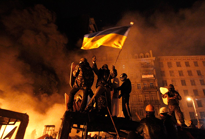 Protests in Ukraine: Anti-government protesters at the site of clashes with riot police in Kiev