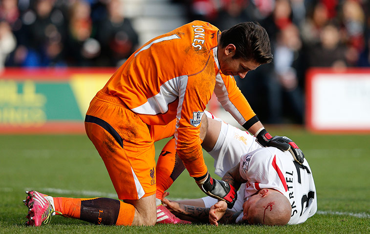 Bournemouth v  Liverpool : Martin Skrtel is comforted by his keeper Brad Jones 