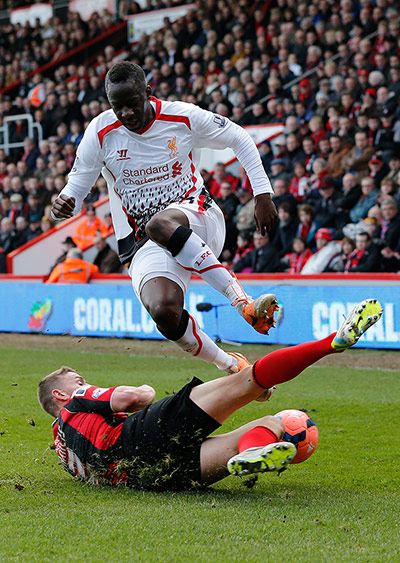 Bournemouth v  Liverpool : Sissoko tackled by Francis