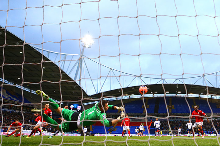 Saturday's games: Cardiff City keeper David Marshall beats away one of Bolton's few chances