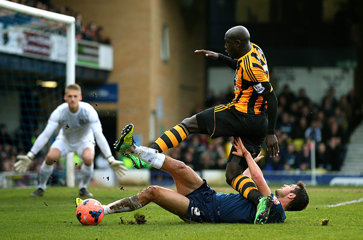 Saturday's games: Yannick Sagbo of Hull is denied by Mark Phillips
