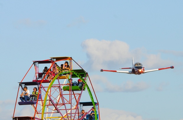 An American pilot performs a stunt during the Ilopango Air Show 2014 in San Salvador