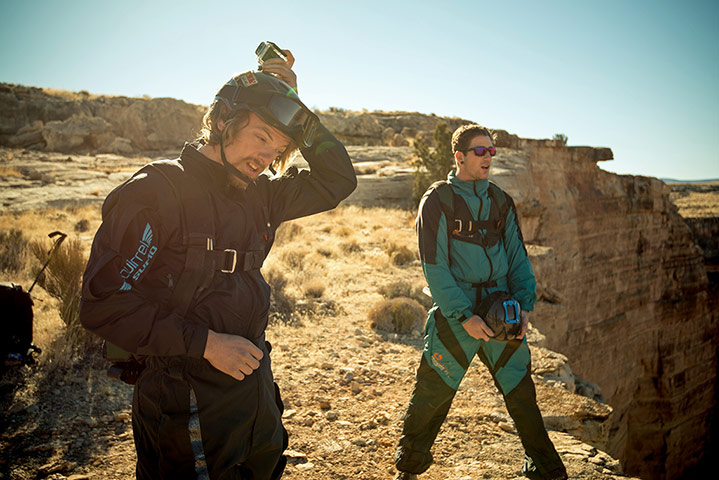 BASE jumping in Utah: Jumper attaches a head-mounted camera to his crash helmet
