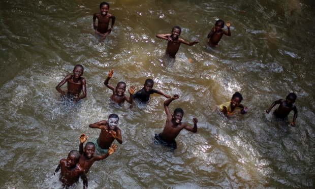 Children swimming in a river near the Central African village of Bobangui.