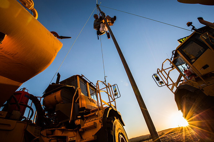 forest: Protester up a tripod blocking two excavation trucks