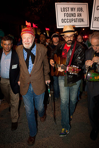 Pete Seeger: Seeger, 92, left, marching with nearly a thousand demonstrators sympathetic