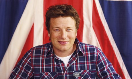 Jamie Oliver infront of flag