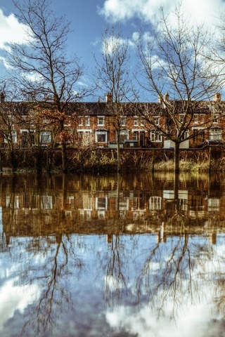 The River Severn in flood and in the car park in Frankwell, central Shrewsbury.