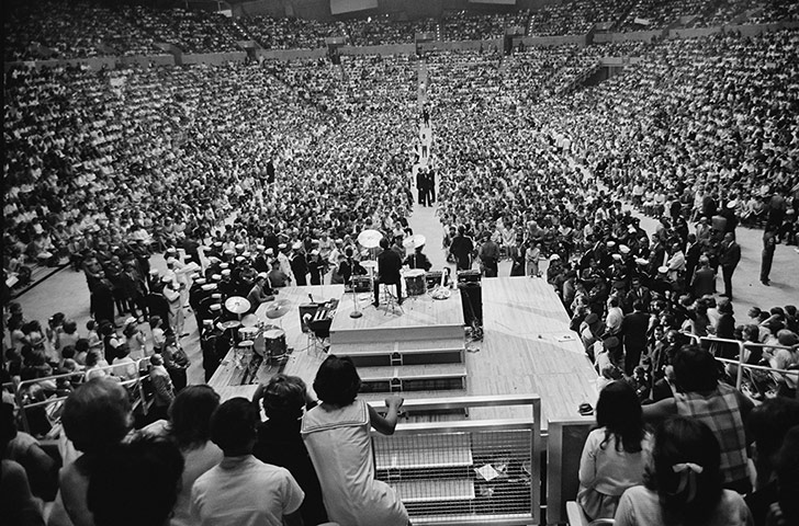 Beatles in America: The Beatles, seen from behind the stage, play live in Las Vegas, August 196