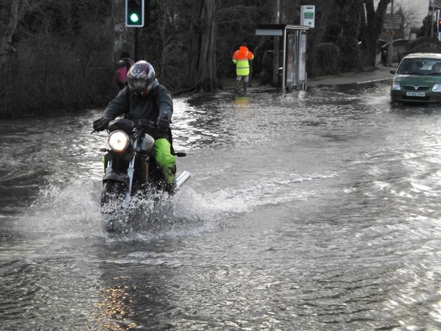 Motorbike braving the waters in Oxford