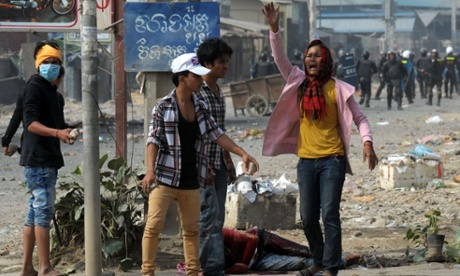 Cambodian garment workers clash with military police in Phnom Penh.