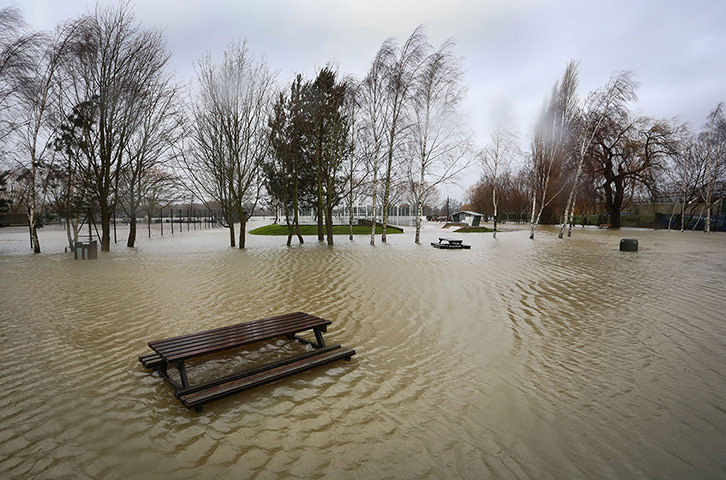 20 Photos: Flood waters remain on the racecourse in Tonbridge, Kent