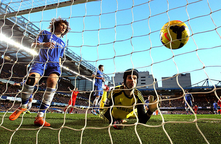 20 Photos: Goalkeeper Petr Cech of Chelsea grasps at the ball at Stamford Bridge