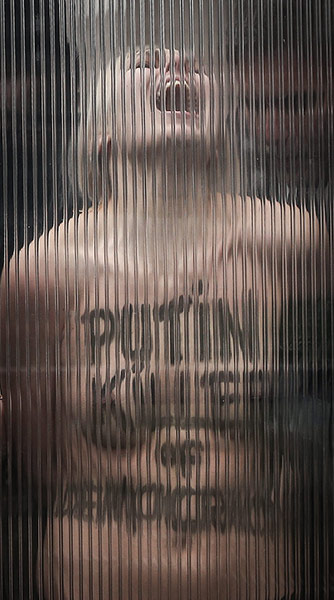 20 Photos: Femen Protest ahead of Putin visit in Brussels