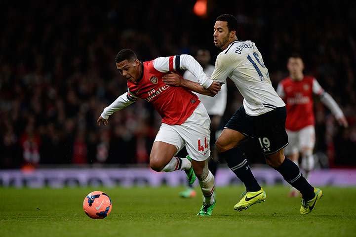 Arsenal v Spurs: Serge Gnabry of Arsenal gets away from Mousa Dembele
