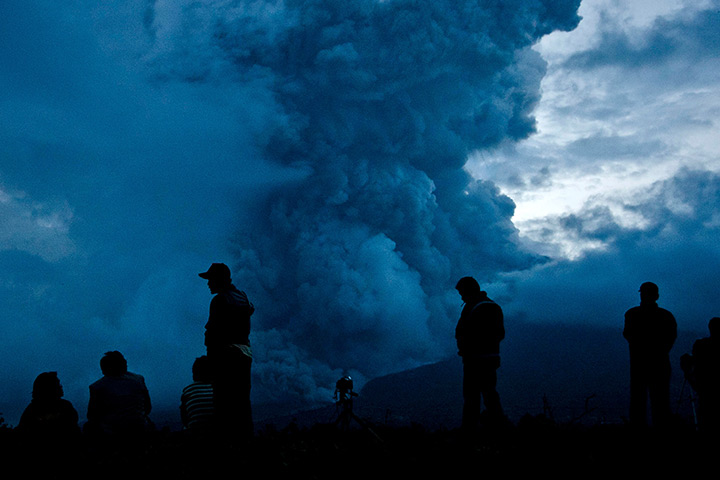 Mount Sinabung: People watch as Mount Sinabung erupts