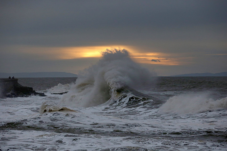 Weekend in pictures: Stormy waves roll in to the shore and break along the seafront at Porthcawl