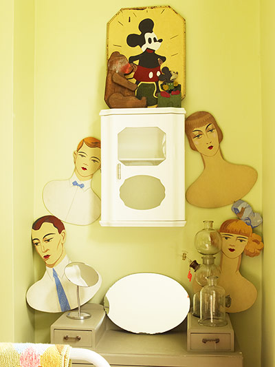 Homes - Hollicks House: bedroom with vintage mirrors against yellow wallsq