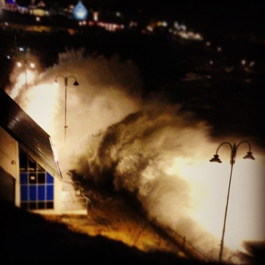 A night view of  Towan Beach, Newquay from the overlooking cliff.