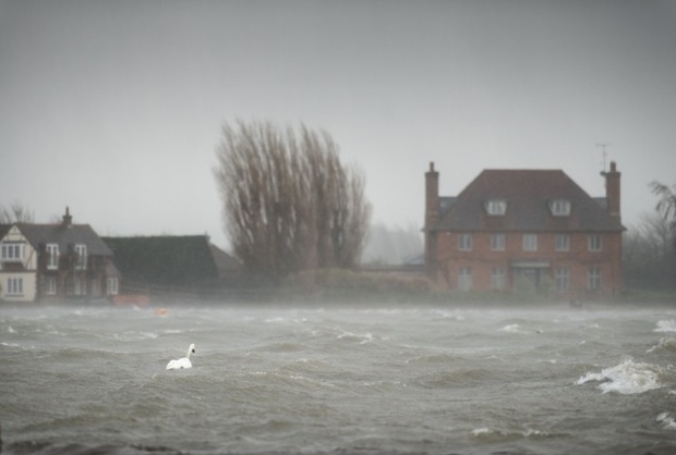 Wind and rain batter Bosham Harbour during a high spring tidal surge
