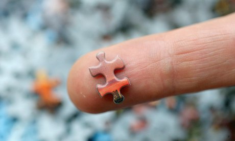 Finger with jigsaw piece on the end.