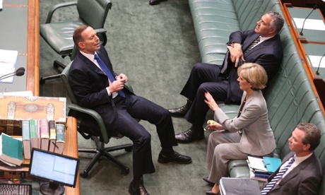 Tony Abbott talks with Foreign Minister Julie Bishop, with Joe Hockey and Christopher Pyne.