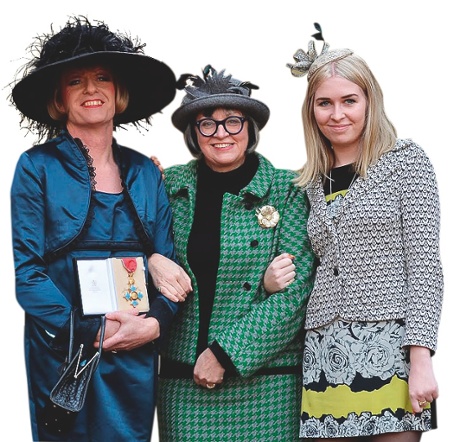 Grayson Perry with his wife Phillipa and daughter Florence, receiving an OBE in 2014 