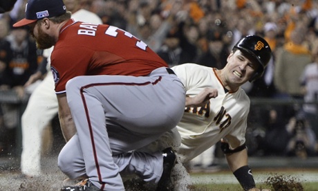 San Francisco Giants catcher Buster Posey should be banned from sliding into home plate.